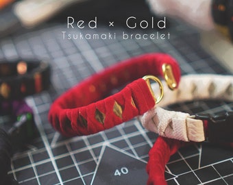 Bracciale Tsukamaki rosso acceso - Nucleo in metallo, estremità dell'anello in oro - Un braccialetto artigianale con impugnatura avvolgente in stile katana giapponese