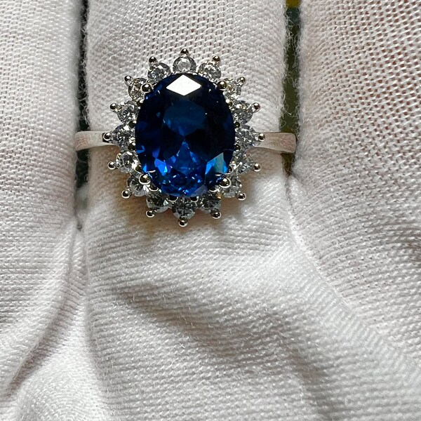 A Vintage Style 2.6CT Oval Cut Velvety Blue Sapphire Created Halo Ring