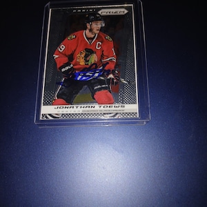 Cartão autografado por Jonathan Toews com cacau