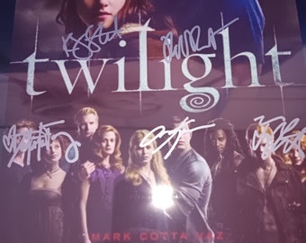 Kristen Stewart, Robert Pattinson, Taylor Lautner, Dakota Fanning, Anna Kendrick autographed Twilight promo with coa.  Approximately 8x10 in