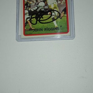 Johnny Riggins autographed  card with coa