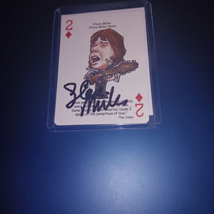 Cartão autografado por Steve Miller com cacau
