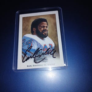 Carte dédicacée Earl Campbell avec certificat d'authenticité
