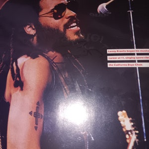 Lenny Kravitz autographed promo with coa. Approximately 8x10 inches