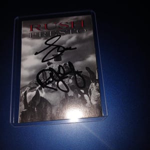 Neil Peart, Geddy Lee autógrafo com coa