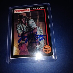 Larry Johnson autografou um cartão de avó com coa