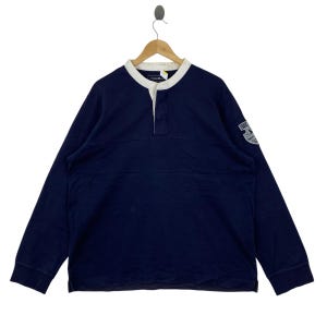 Vintage 90-tals Eddie Bauer Henley Rugbytröja Herr XL Marinblå Långärmad Bomullströja Vit Krage Ärm Vapensköld Patch Outdoor Gorpcor