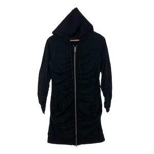 May include: A black hooded sweatshirt with a full-length zipper and ruched detailing. The long-sleeved garment has a hood with a drawstring and two front pockets. The sweatshirt is hanging on a wooden hanger against a white background.