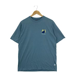 Montbell Wickron T-shirt Precious Earth Graphic Gorpcore Streetwear Storlek Medium Blå Performance Vandringströja Japan Outdoor Style
