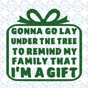 May include: Green gift box with a bow and the text "Gonna go lay under the tree to remind my family that I'm a gift."