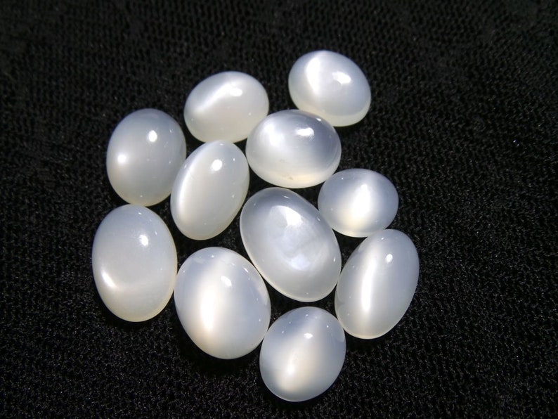 11 Pcs White Moonstone Gemstone. Size - 14.5x10-9.5x8 MM Approx Natural White Moonstone Cabochons Smooth Oval Shape Gemstone Moonstone
