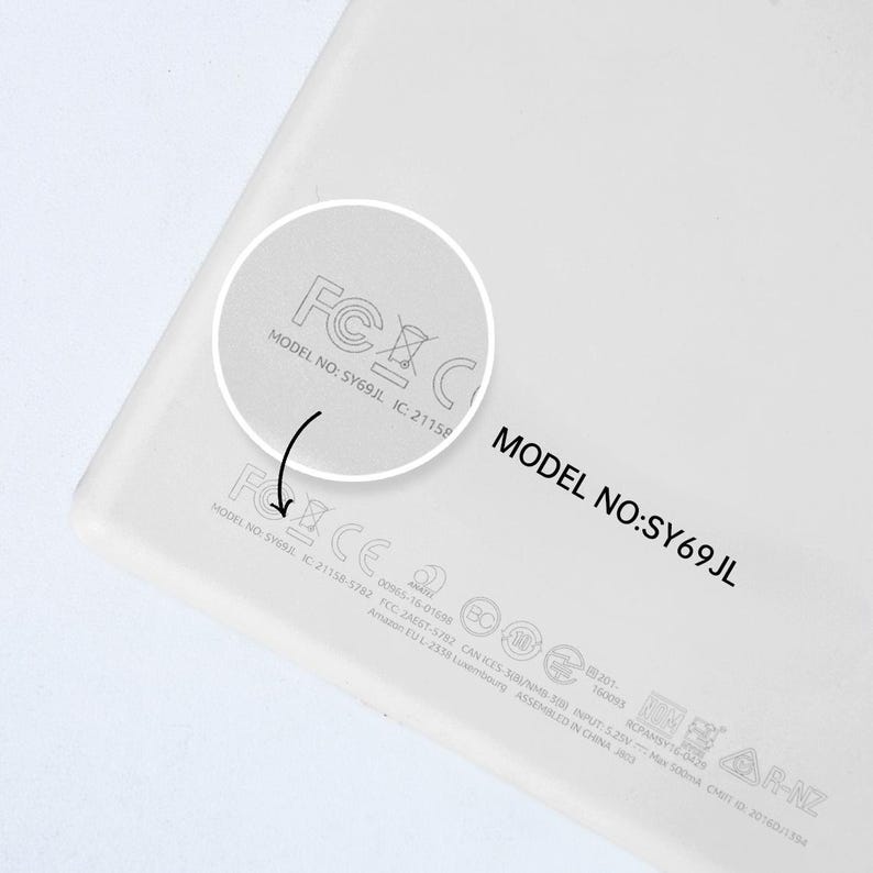 May include: Close-up of a white electronic device with the model number SY69JL and FCC and IC certification marks.