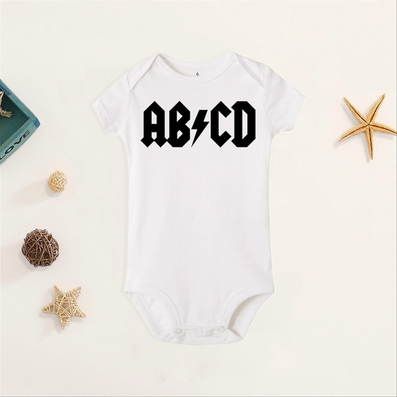 abcd onesie