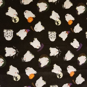 May include: Black fabric with a white ghost pattern. The ghosts are in various poses, some holding pumpkins, some wearing witch hats, and some with bats flying around them.