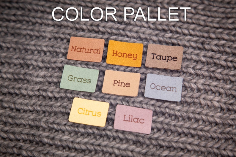 May include: Leather swatches in various colors, including natural, honey, taupe, grass, pine, ocean, citrus, and lilac. The swatches are arranged in two rows on a gray knitted fabric background. The text "COLOR PALLET" is written above the swatches.