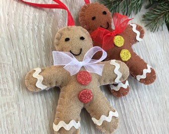 Juego de 2 adornos de jengibre para hombrecito de jengibre navideño.