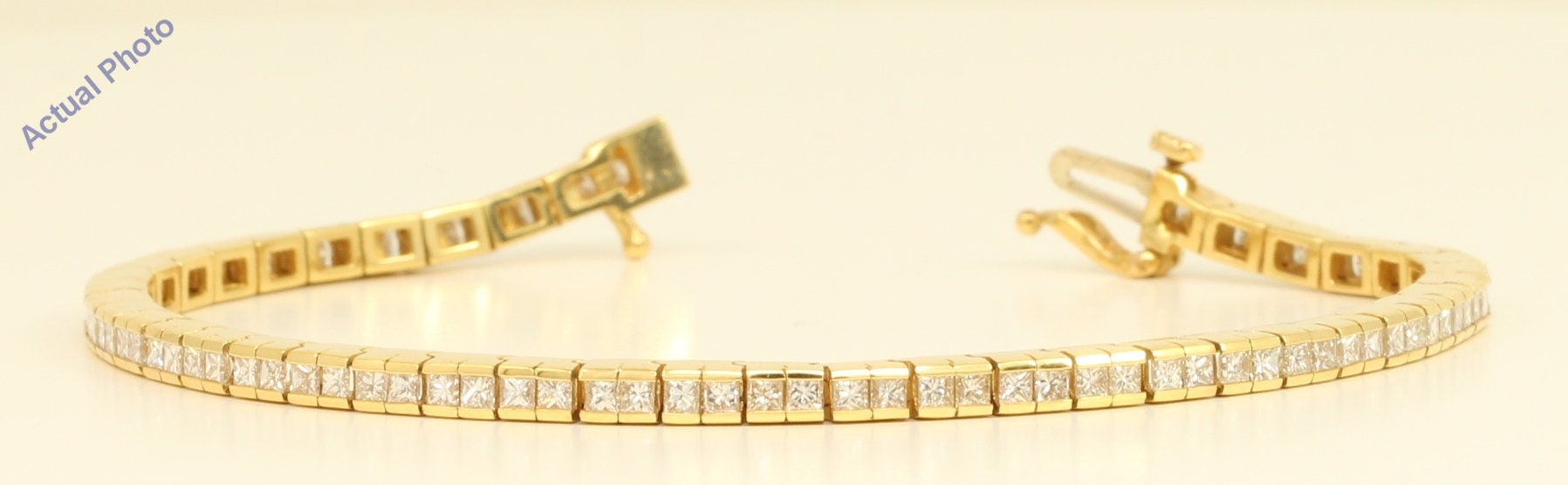 Princess cut diamond tennis 2024 bracelet yellow gold