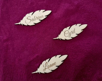 Personalized wooden name and date place mark in the shape of a feather for wedding, baptism, birthday, table decoration, party