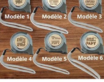Peut inclure: Six modèles différents de rubans à mesurer avec différentes citations sur le fait d'être un "Papy" ou un "Super Papy".