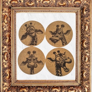 May include: A framed artwork with four circular coasters, each depicting a giraffe illustration. The giraffes have different expressions, drawn in black ink on a tan background. The frame is gold-coloured and ornate.