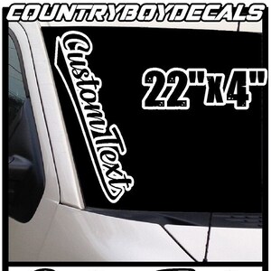 May include: Black and white custom text decal for a car windshield. The decal is 22 inches by 4 inches and says "Custom Text".