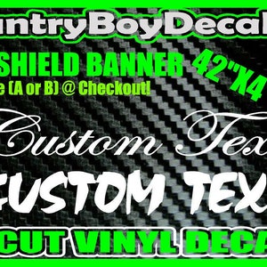 May include: A black and white carbon fiber patterned windshield banner with the text "Country Boy Decals" in white. The banner is 42 inches by 4 inches and has the text "WINDSHIELD BANNER 42"X4"" in green. The banner has two options for text: "Custom Text" in a cursive font and "CUSTOM TEXT" in a bold font. The text "Pick One (A or B) @ Checkout!" is in green. The text "DIE-CUT VINYL DECAL" is in green.