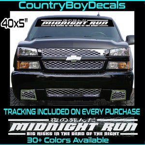 May include: A black truck with a white vinyl decal on the windshield that reads "夜の死んだ MIDNIGHT RUN -BIG RISKS IN THE DEAD OF THE NIGHT-". The decal is 40 inches by 5 inches.  The decal is available in 30+ colors.