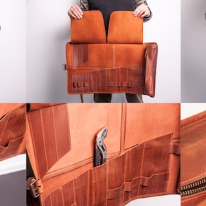 Peut inclure: Un sac &agrave; outils en cuir marron qui se roule avec plusieurs poches et un compartiment zipp&eacute;. Le sac est pr&eacute;sent&eacute; roul&eacute;, d&eacute;roul&eacute; et avec les poches ouvertes.