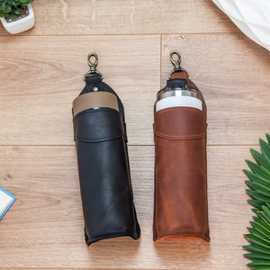 120BOTTLESTRAPLEA Leather bottle holder with straps - Small Leather Goods -  Maje.com