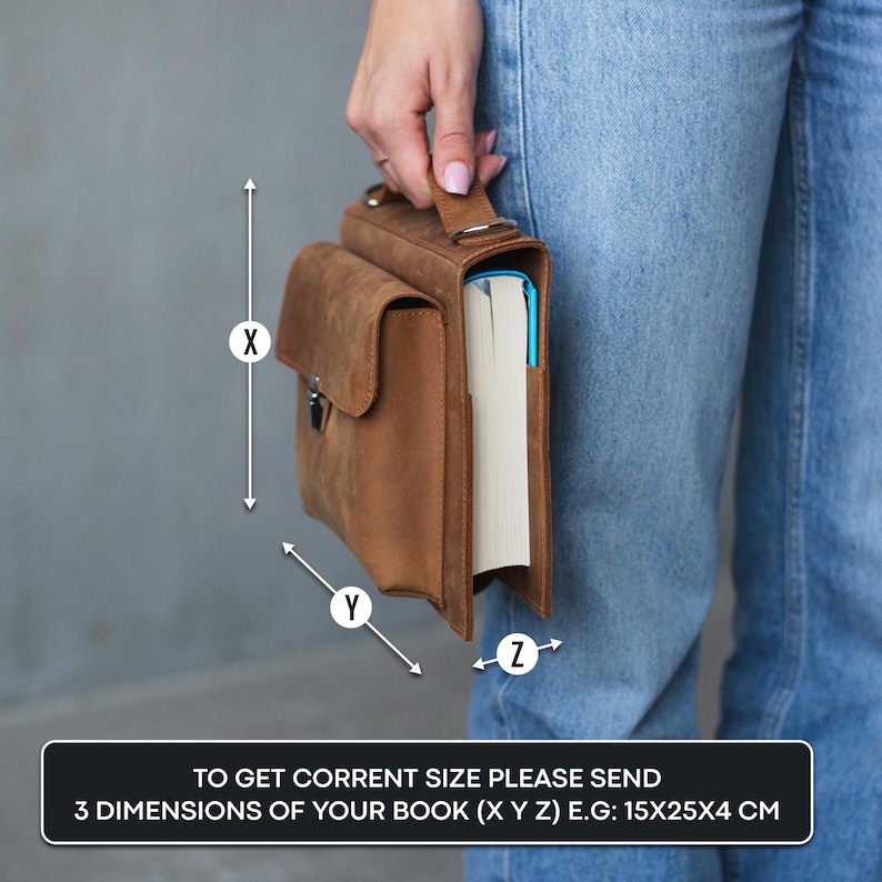 May include: A brown leather book bag with a flap closure and a handle. The bag is designed to hold a book, and the image shows the dimensions to measure your book to ensure a proper fit.  To get the correct size, please send 3 dimensions of your book (X Y Z) E.G: 15X25X4 CM