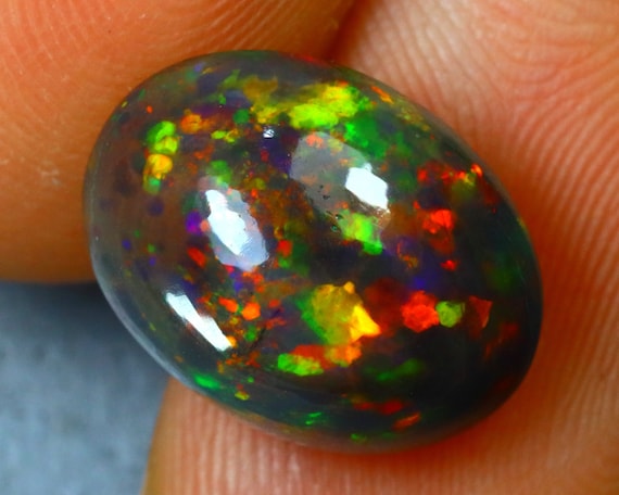 Welo Opal 4.44Ct Natural Ethiopian Smoked Play of Color Opal S1190