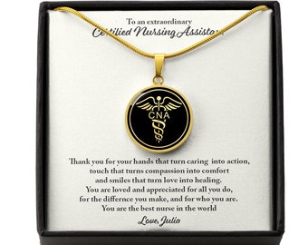 May include: Gold necklace with a black and gold pendant featuring the Caduceus symbol and the letters "CNA". The necklace comes in a black box with a gold inscription that reads "To an extraordinary Certified Nursing Assistant. Thank you for your hands that turn caring into action, touch that turns compassion into comfort and smiles that turn love into healing. You are loved and appreciated for all you do, for the difference you make, and for who you are. You are the best nurse in the world. Love, Julia."