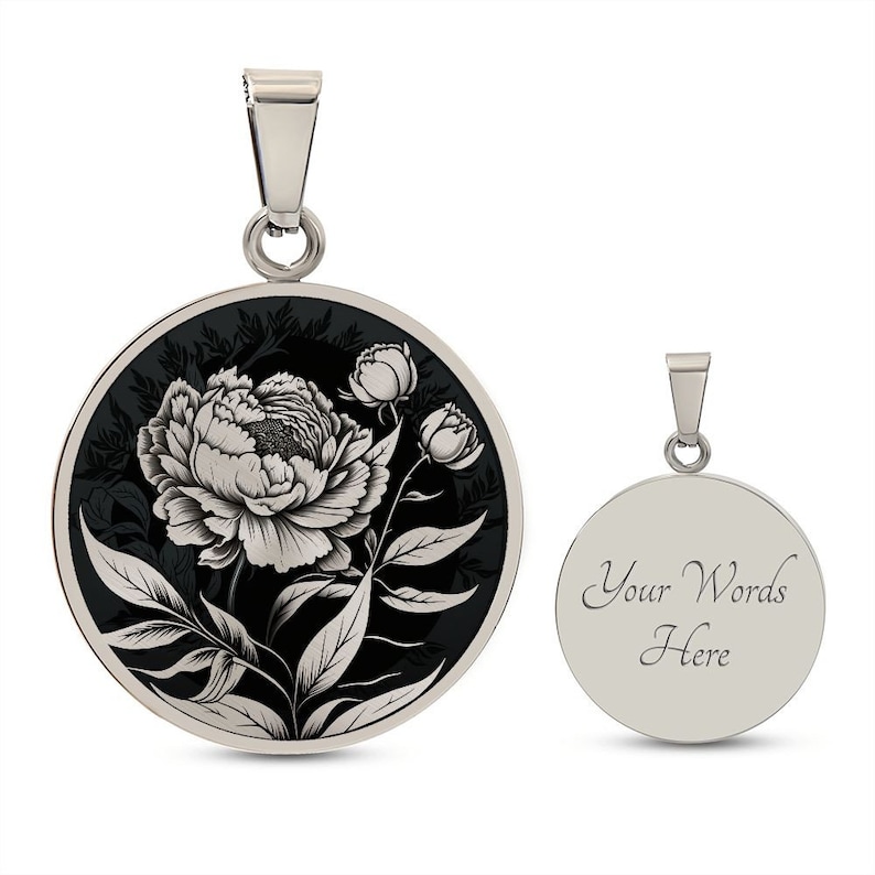 May include: A silver pendant with a black and white engraved image of a peony flower. The back of the pendant is blank and can be engraved with text. "Your Words Here" is shown as an example.