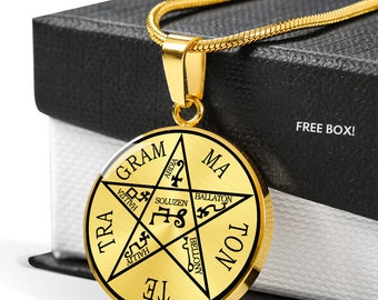 May include: Gold necklace with a round pendant featuring a five-pointed star with the words "GRAM", "TRA", "TE", "TON", and "MA" around the star. The star has the words "ABDIA", "SOLUZEN", "BALLATON", and "BELLONY" inscribed within it.