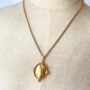 Vintage Monet Polished Gold Plated Oval Pendant Necklace
