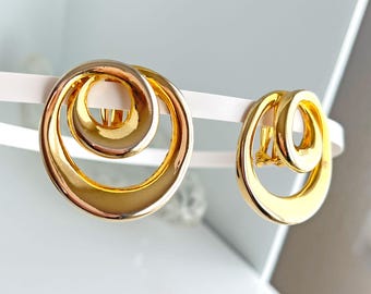 Grandes boucles d'oreilles vintage des années 1980 avec cercle plongeant doré à clip