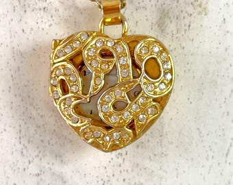 Vintage hangerhorloge goudkleurige ketting met gezwollen hart