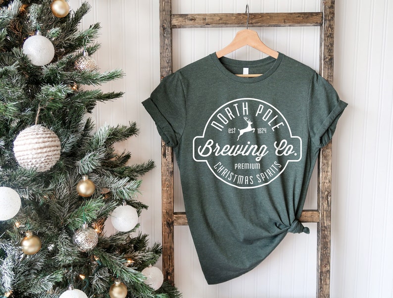 Unisex North Pole Brewing Co. Graphic Tee Premium Christmas image 1