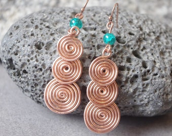 Wrapped copper wire earrings with glass turquise bead. Spiral, vortex, three circles pattern. Wire wrapped earrings with beads Wire jewelry