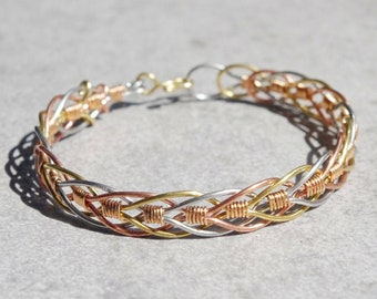 Multielement four alloy wrapped bracelet: bronze, brass, copper, stainless steel. Braid. Unisex multicolor wire bangle. Four colour bracelet
