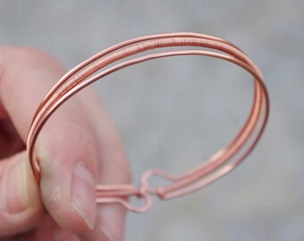 Thin minimal bronze copper wire wrapped bracelet. Tripple wire pattern.