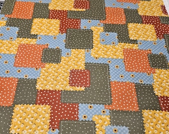 Fall patchwork quilt fabric is priced by the yard and is 100% cotton material