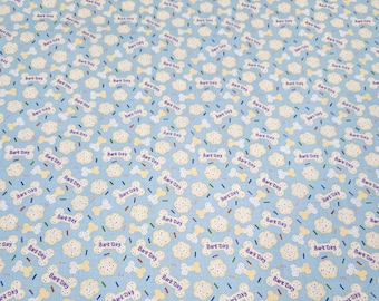 Dog Bark day Blue material is sold by the yard and is 100% cotton fabric