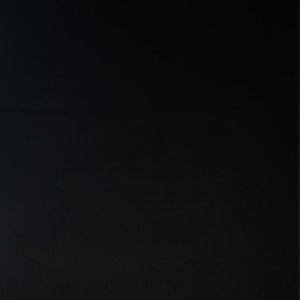 Kona Black cotton material is sold by the yard and is 100% cotton fabric