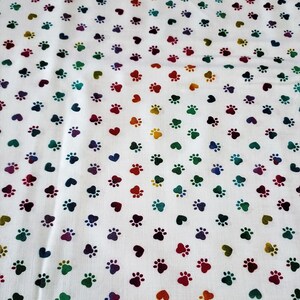 Rainbow dog prints and hearts on white background material by the yard 100% Cotton