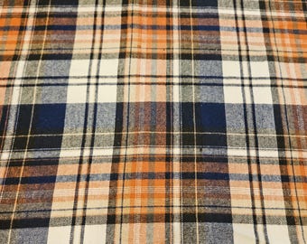Geweven flanel blauw en oranje geruit, op maat gesneden geprijsd, 100% katoen