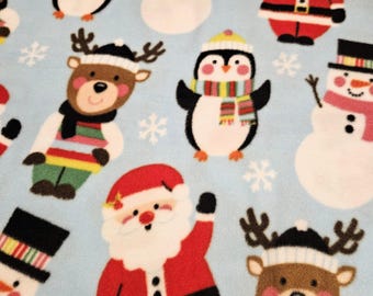 Christmas Santa and Friends Fleece Fabric: 100% Polyester, priced by the yard