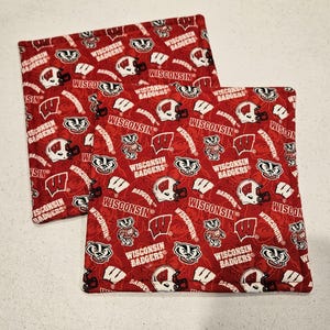 Agarraderas universitarias de la NCAA de Wisconsin Badgers, juego de 2