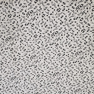 Music notes on white background material is sold by the yard and is 100% cotton fabric