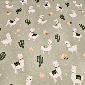 Llama FLANNEL fabric is sold by the yard and is 100% cotton material